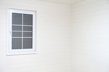 window in white wall interior