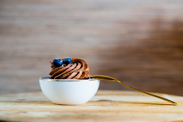 decorated  tasty Cupcake with slice of Strawberry and Chocolate on the table. Horizontal view several objects