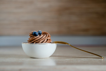 decorated  tasty Cupcake with slice of Strawberry and Chocolate on the table. Horizontal view several objects