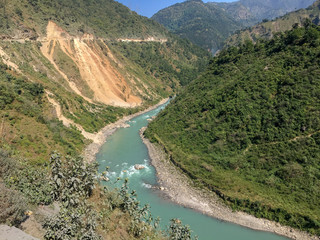 Fototapeta na wymiar Riverside view in the Mountains (Himalayas)