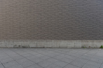 Fototapeta premium street wall background ,Industrial background, empty grunge urban street with warehouse brick wall