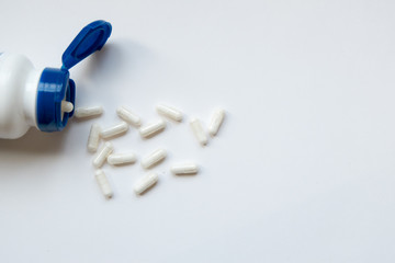 Vitamins bottles on the white background