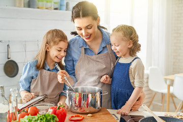 Happy family in the kitchen.