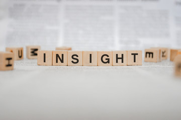 Insight Word Written In Wooden Cube - Newspaper 