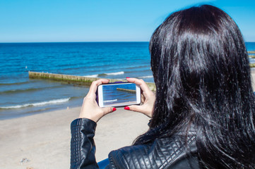 young woman using a mobile smartphone