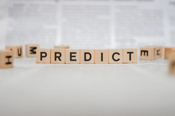 Predict Word Written In Wooden Cube - Newspaper 