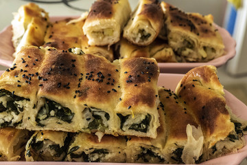 homemade pastries, spinach pie, sesame buns and bagels, Turkish style dough food,
