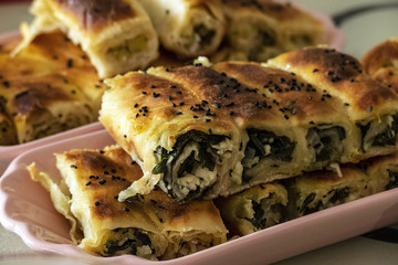 homemade pastries, spinach pie, sesame buns and bagels, Turkish style dough food,
