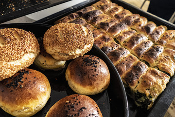 homemade pastries, spinach pie, sesame buns and bagels, Turkish style dough food,