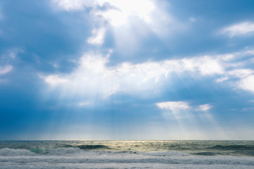 Big sea waves, big storm, weather elements on background of blue sky