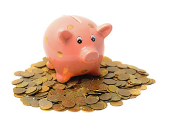 Piggy bank and coins isolated