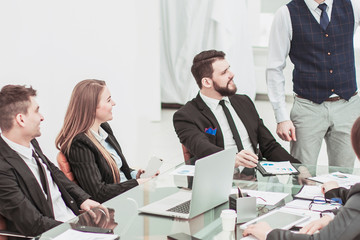 business team discussing the presentation of a new financial project on a workplace at office