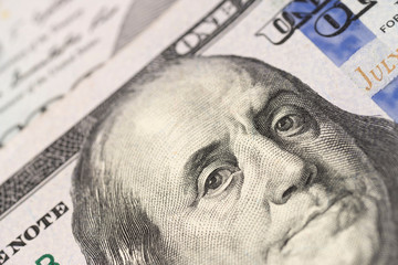 Benjamin Franklin on hundred dollars banknote. 