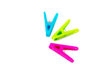 clothespin made of colorful plastic on white background
