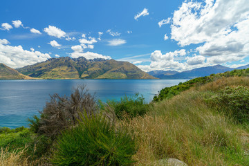 mountains at lake wakatipu on a sunny day, otago, southern alps, new zealand 18