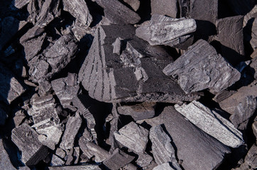 Blacksmiths coals burning for iron work, background