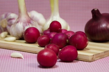 fresh red radish, red onion and garlic