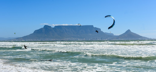 Kite surfing is a popular sports in Cape Town Beaches, South Africa