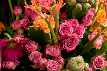 Roses, gerberas, callas and other exotic flowers in bouquete