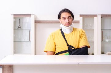 Young man after car accident suffering at home 