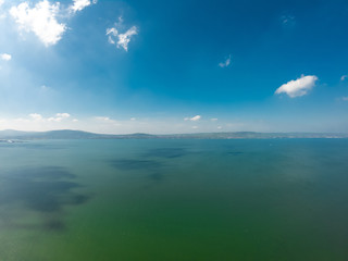 beautiful landscape. Aerial view of beach and coast of Irish Sea in Holywood, Northern Ireland. Horizon over water against blue sky 