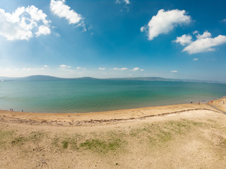 beautiful landscape. Aerial view of beach and coast of Irish Sea in Holywood, Northern Ireland. Horizon over water against blue sky 