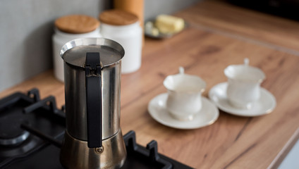 Preparing a traditional italian style coffee with coffee percolator. Making a coffe.