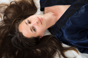 Top view of woman with flowing hair in blue robe