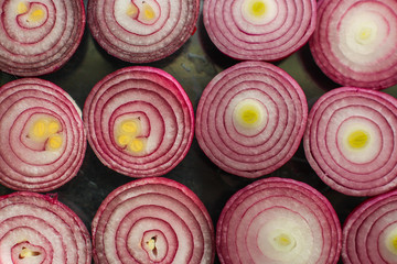 Red onion. juicy fresh vegetable cut, slices. food background. top view