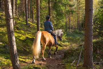 Woman horseback riding