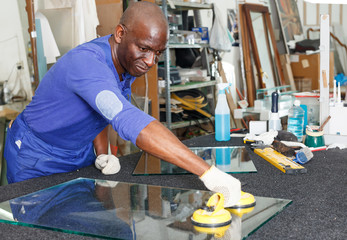 Adult African American glazier during daily work