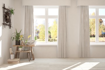 Stylish empty room in white color with autumn landscape in window. Scandinavian interior design. 3D illustration