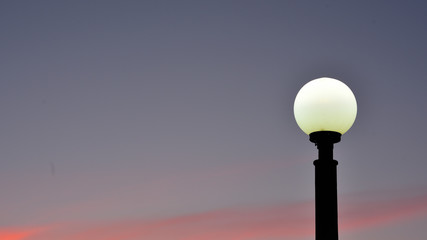Fototapeta na wymiar lamp on the background of blue sky