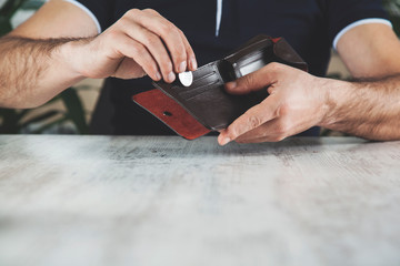 man hand coin with wallet