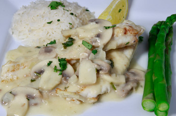Dover Sole fillets in white wine & mushroom sauce