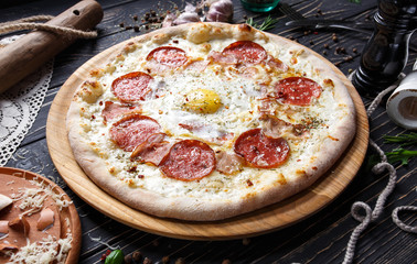 Aromatic pizza with egg and sausage. Mockup.