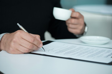 Businessman signing a contract