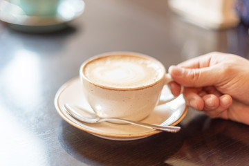 a man drinks coffee for breakfast