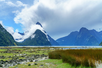 mountains in the clouds, milford sound, fiordland, new zealand 14