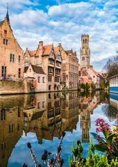 Papier Peint photo Brugges Landscape with famous Belfry tower and medieval buildings along a canal in Bruges, Belgium