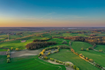 aerial view of green fields