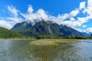 mountains in the clouds, milford sound, fiordland, new zealand 48