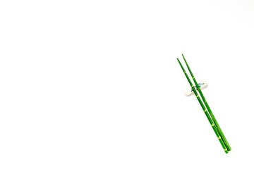 bamboo sticks for sushi and maki on white background top view mockup