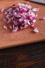 red onion cut on a wooden board
