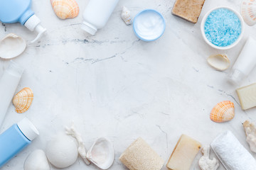 Dead Sea cosmetics with natural ingredients on stone table background top view space for text