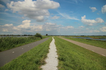 Pedistrian and cycle lane at dyke of river Rotte in Zevenhuizen