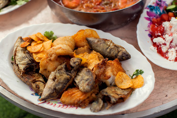 Sea food dishes in plates on the table