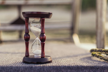 Hourglass on the stone.