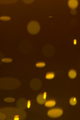 Refraction of drops of beer inside a glass