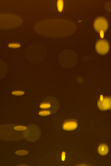 Refraction of drops of beer inside a glass